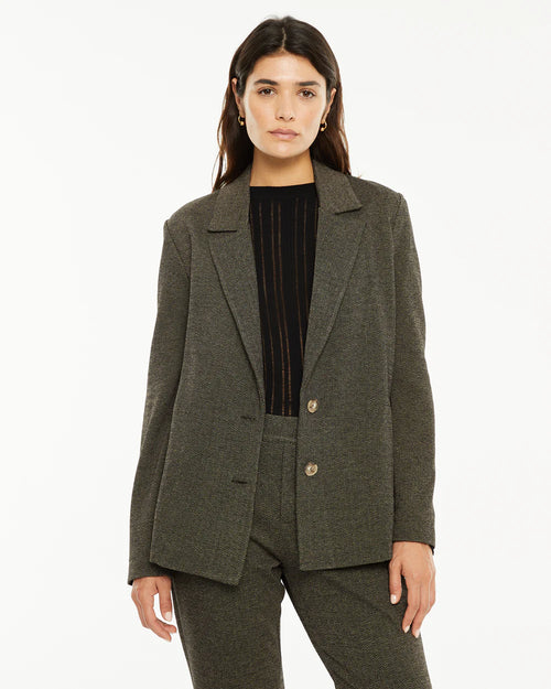 AMERICANA ELÁSTICA ESPIGA MARRÓN System Action