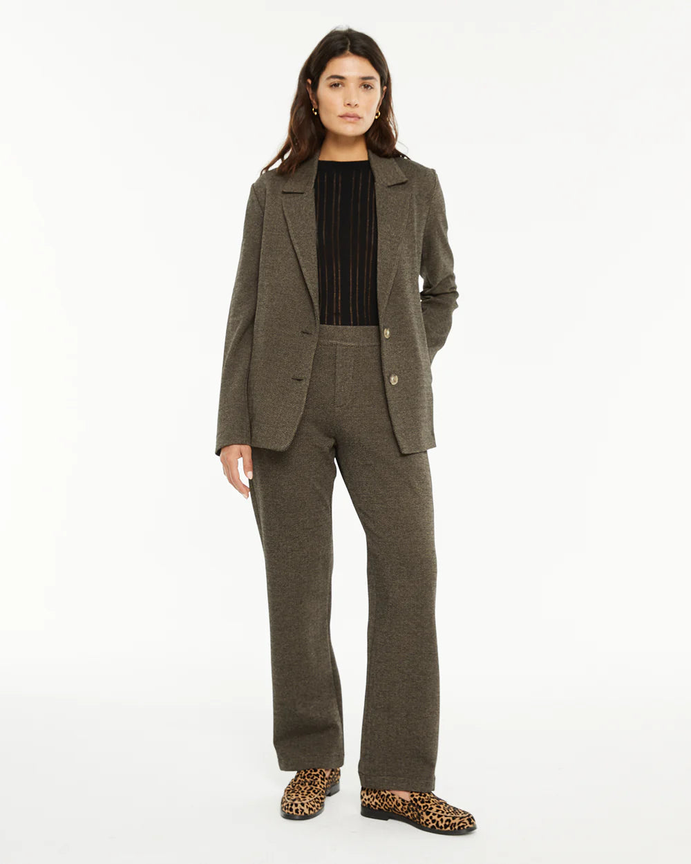 AMERICANA ELÁSTICA ESPIGA MARRÓN System Action