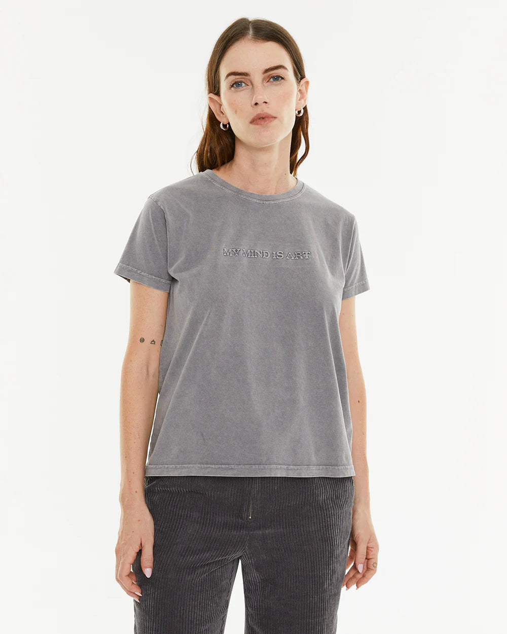 CAMISETA EMBOSSED System Action